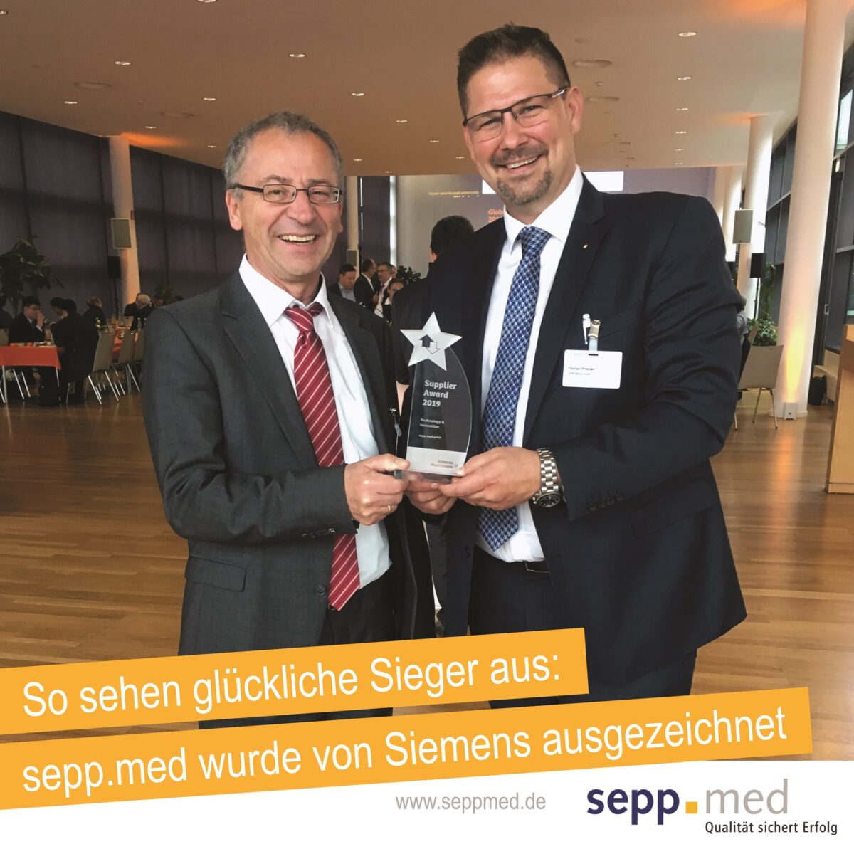 Two smiling men in suits hold a glass award at an indoor event. The text underneath reads: This is what happy winners look like: sepp.med was honored by Siemens. sepp.med logos are also visible.